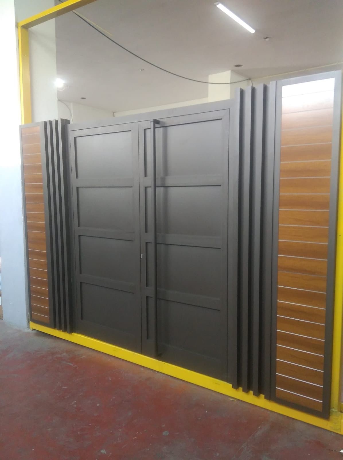 Hybrid fence panel with composite lower section and natural wood upper slats