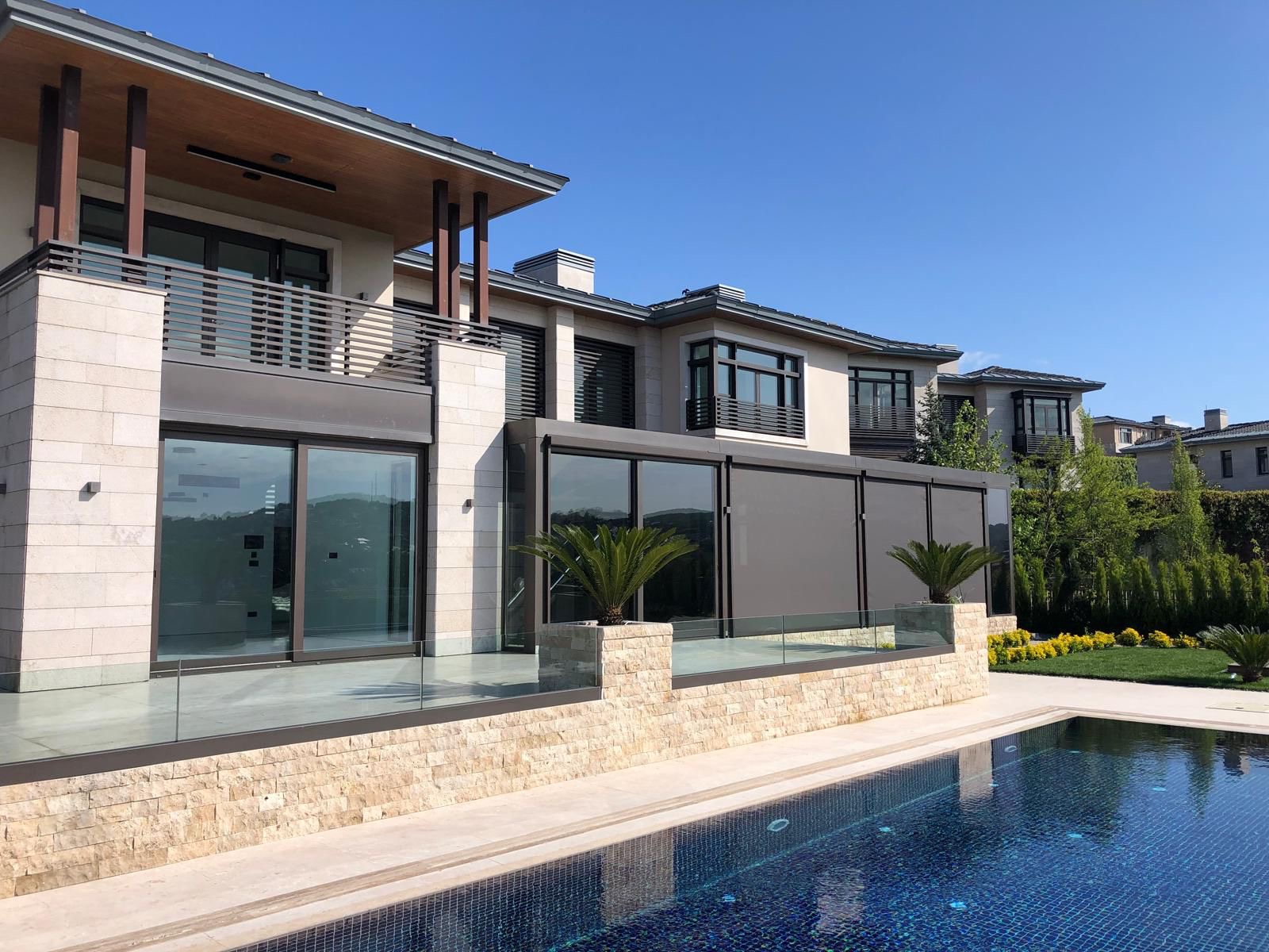 Combination fence with patterned concrete and slatted top