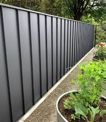 Vertical panel fence with garden and planters